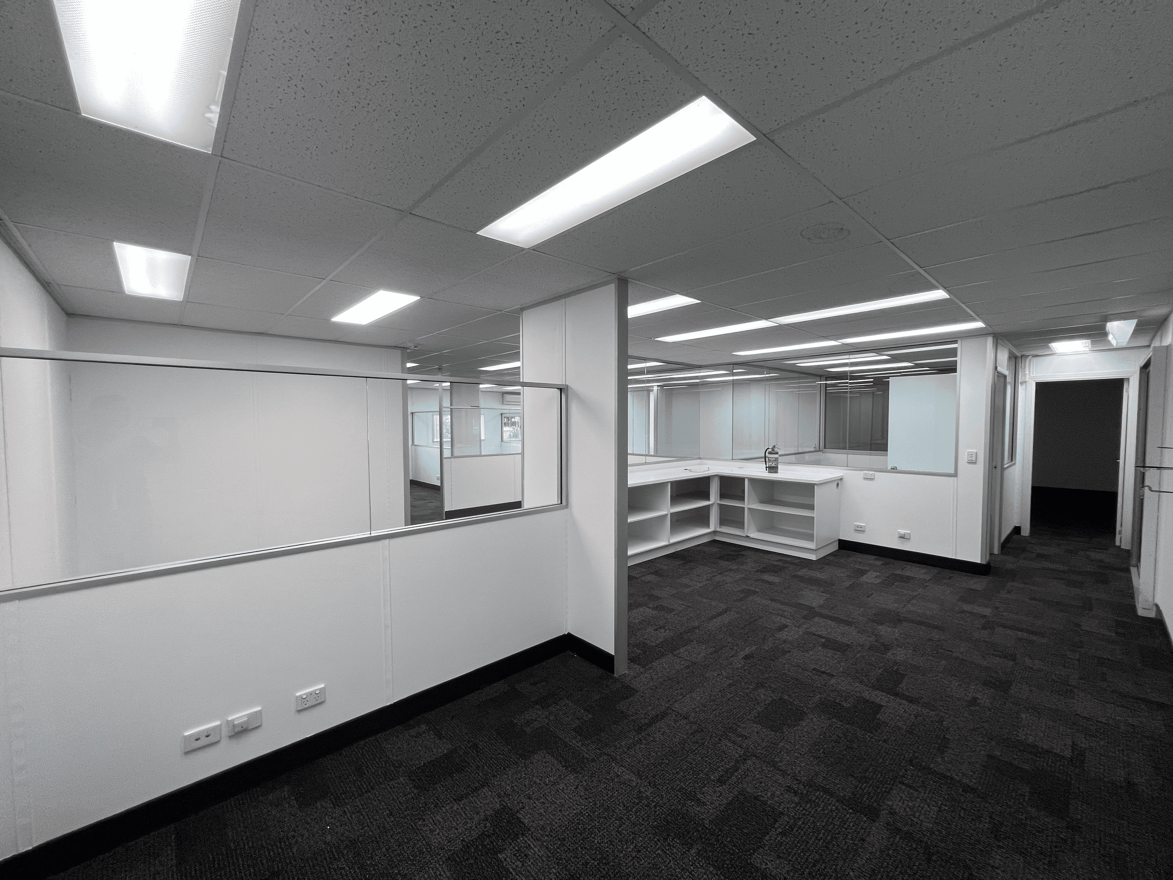 Office painting detail. Freshly painted walls and ceiling in a Brisbane commercial interior