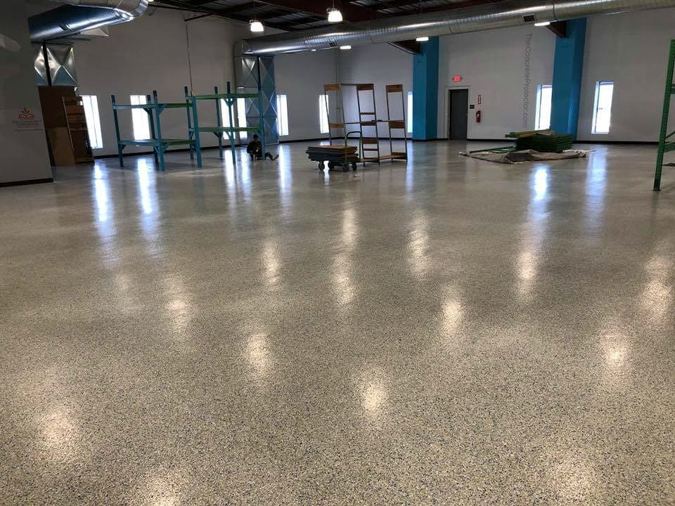 Epoxy flooring Brisbane. Completed garage floor coating by Metro Painting Group