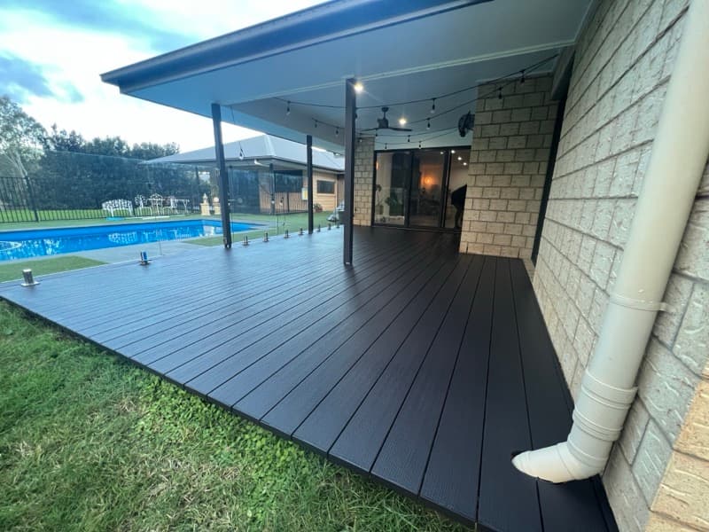 Fence and deck painting Brisbane, freshly stained dark timber deck
